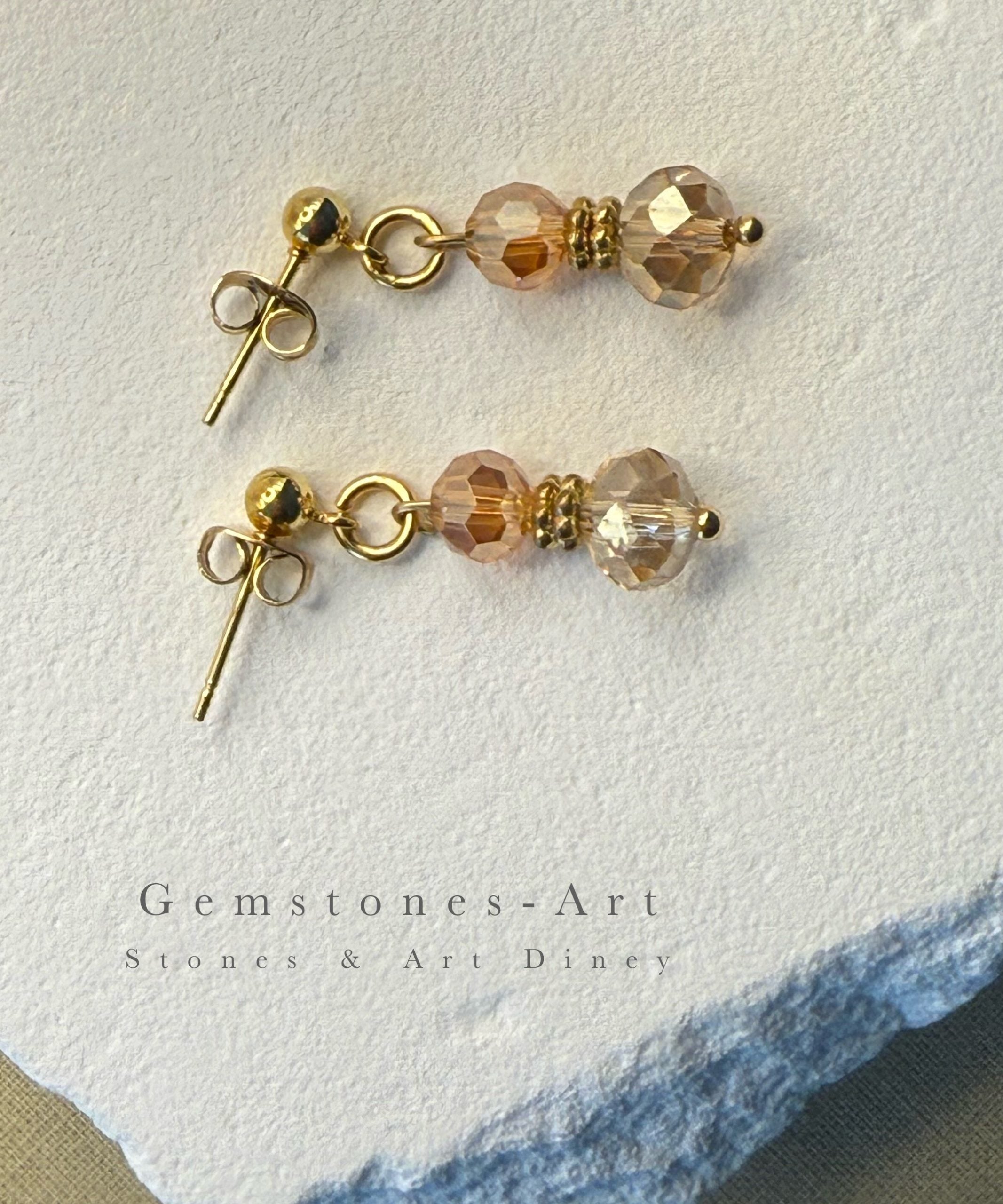Oorbellen 14kt met facet kraal champagne image 0