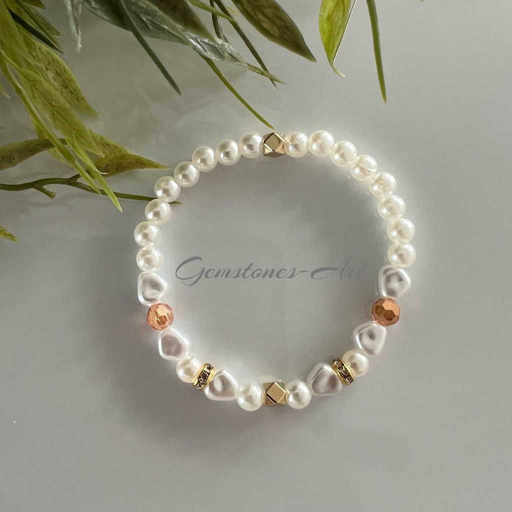 Armband - zoetwaterparel met golden healer facetkraal image 1